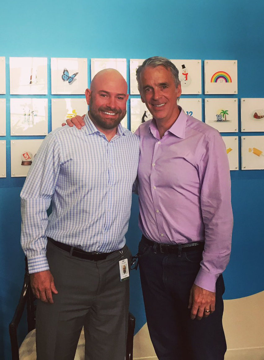 Tyler Clark with Parker Harris, Founder of Salesforce